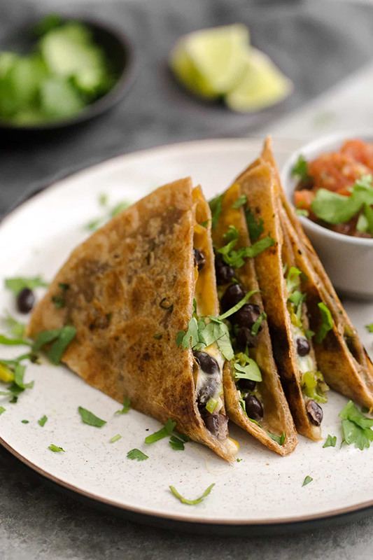 25 delicious ways to spice up National Pepper Month l black bean quesadillas with shishito peppers