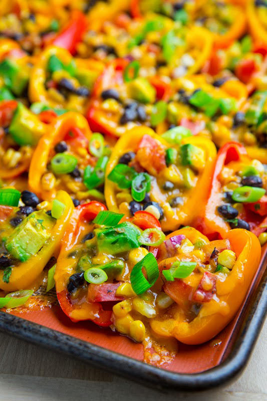 25 delicious ways to heat up National Pepper Month l mini pepper nachos with corn, black beans and avocado