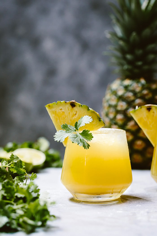 25 delicious ways to spice up National Pepper Month l spicy pineapple jalapeno mezcalita